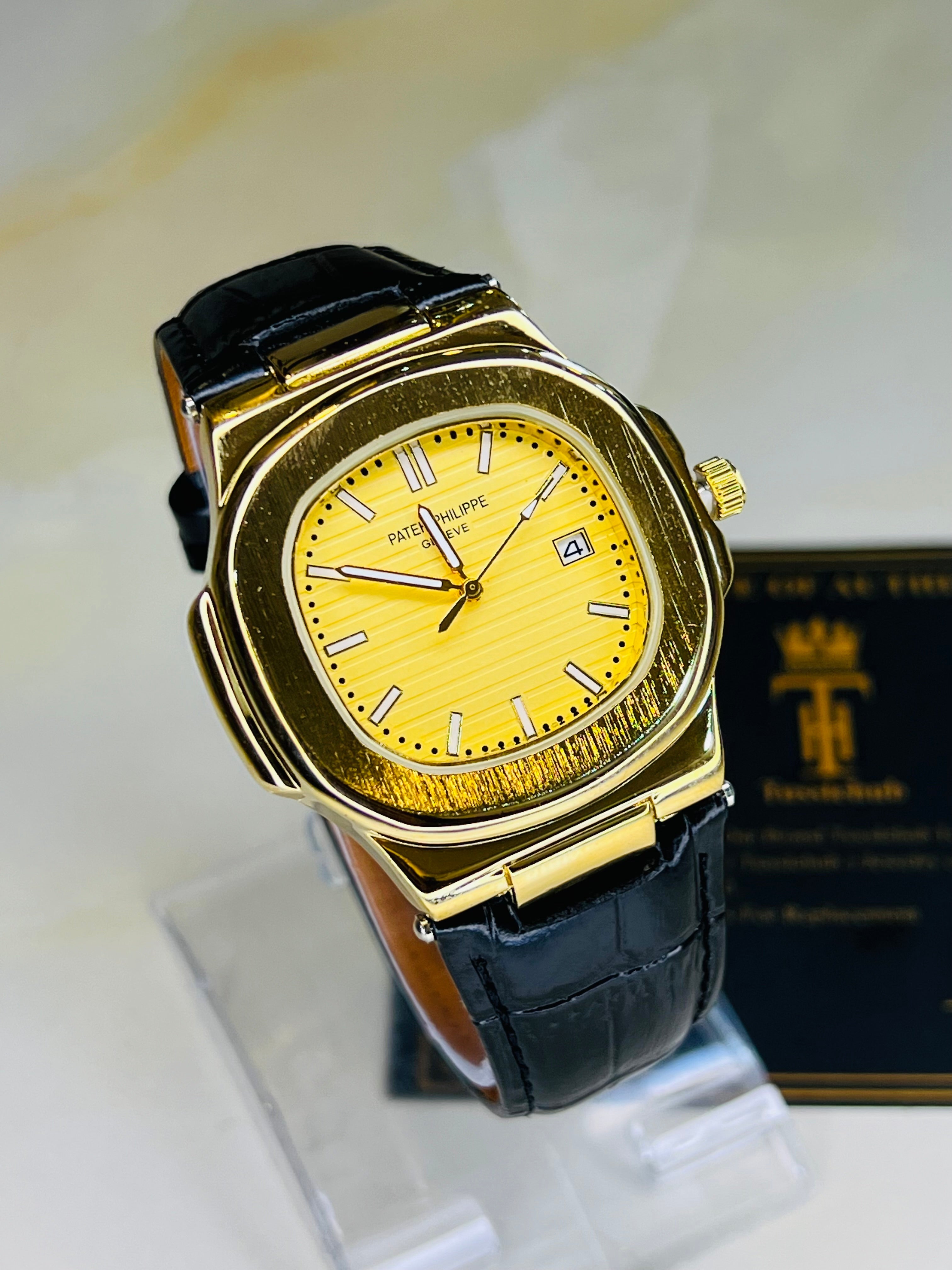 PP Black Leather Strapped Gold Watch